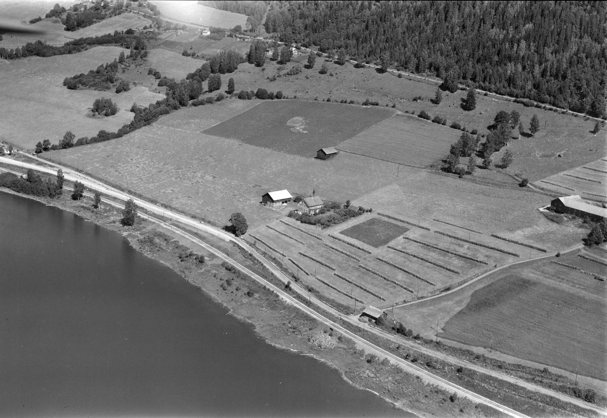 Widerøes Flyveselskap A/S, Flyfoto av Øgarden, Brøttum, Ringsaker.