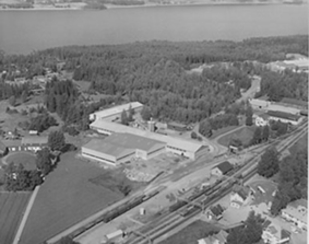 Widerøes Flyveselskap A/S, Flyfoto av Moelven Bruk, Laminator.