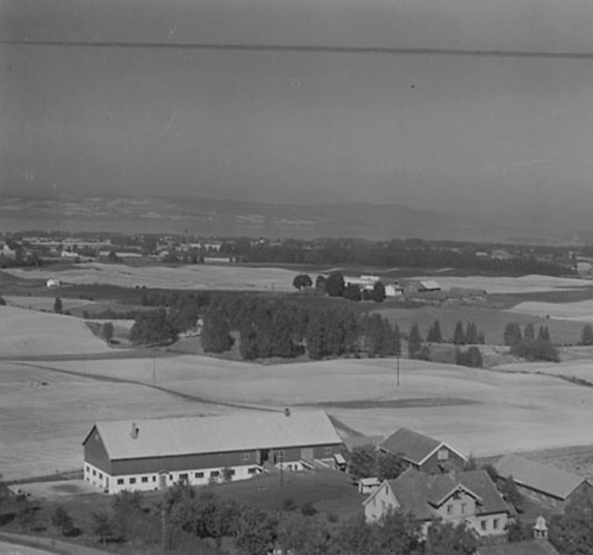 Widerøes Flyveselskap A/S, FLYFOTO LALUM SØNDRE, STANGE