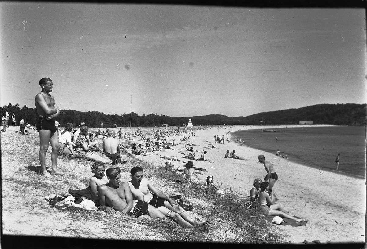 Håkon Prestkværn, Mennesker på ei badestrand.