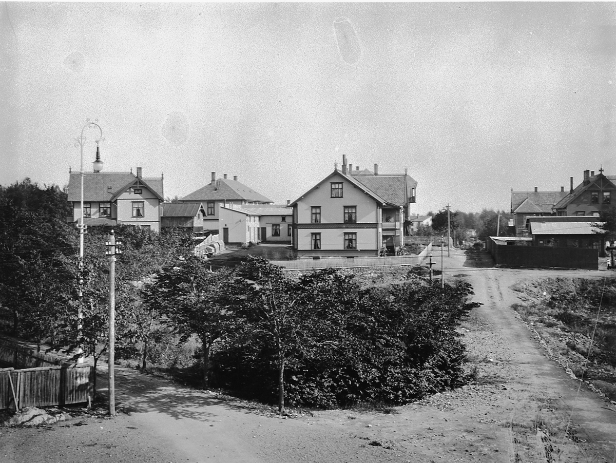 Hans Emil Erichsen, St. Olavsgate i Hamar. Gatelykt. Gatebelysning.