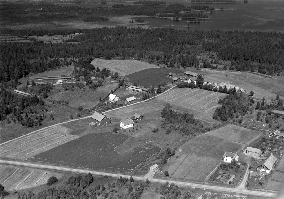 Widerøes Flyveselskap A/S, Flyfoto av Byenstua, Ring, Ringsaker.