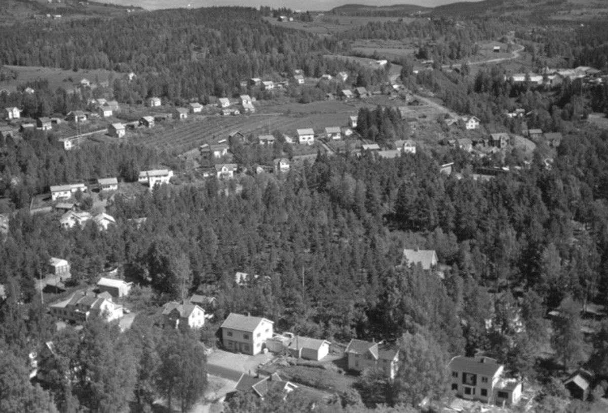 Widerøes Flyveselskap A/S, Flyfoto av Storgata, Moelv sentrum, Ringsaker.