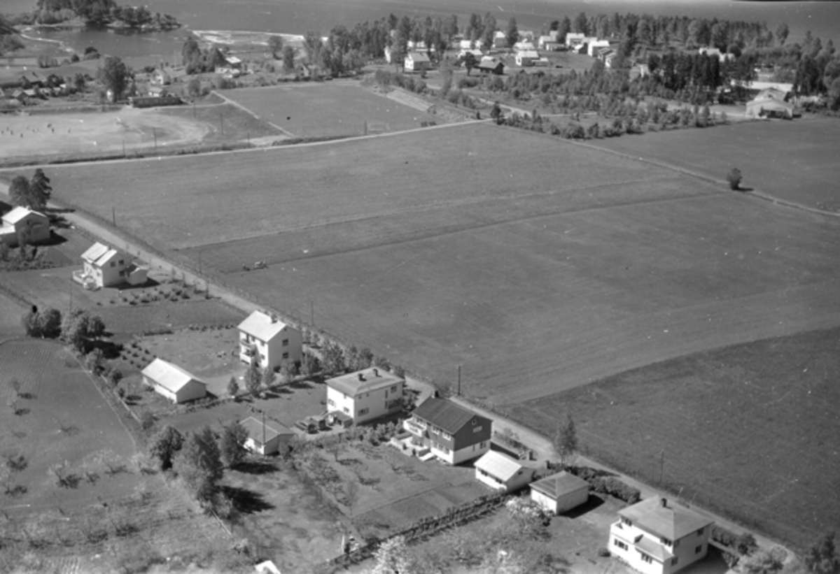 Widerøes Flyveselskap A/S, Flyfoto av Idrettsvegen, Idrettsparken, Moelv, Ringsaker.