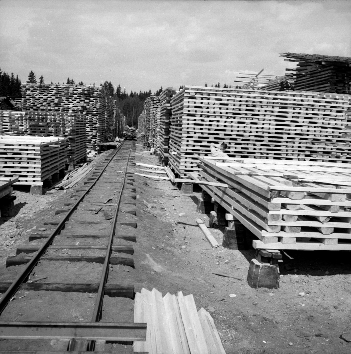 Anno Domkirkeodden, Trelastlager, plankestabler, jernbanespor, Berger Langmoen A/S, Brumunddal.