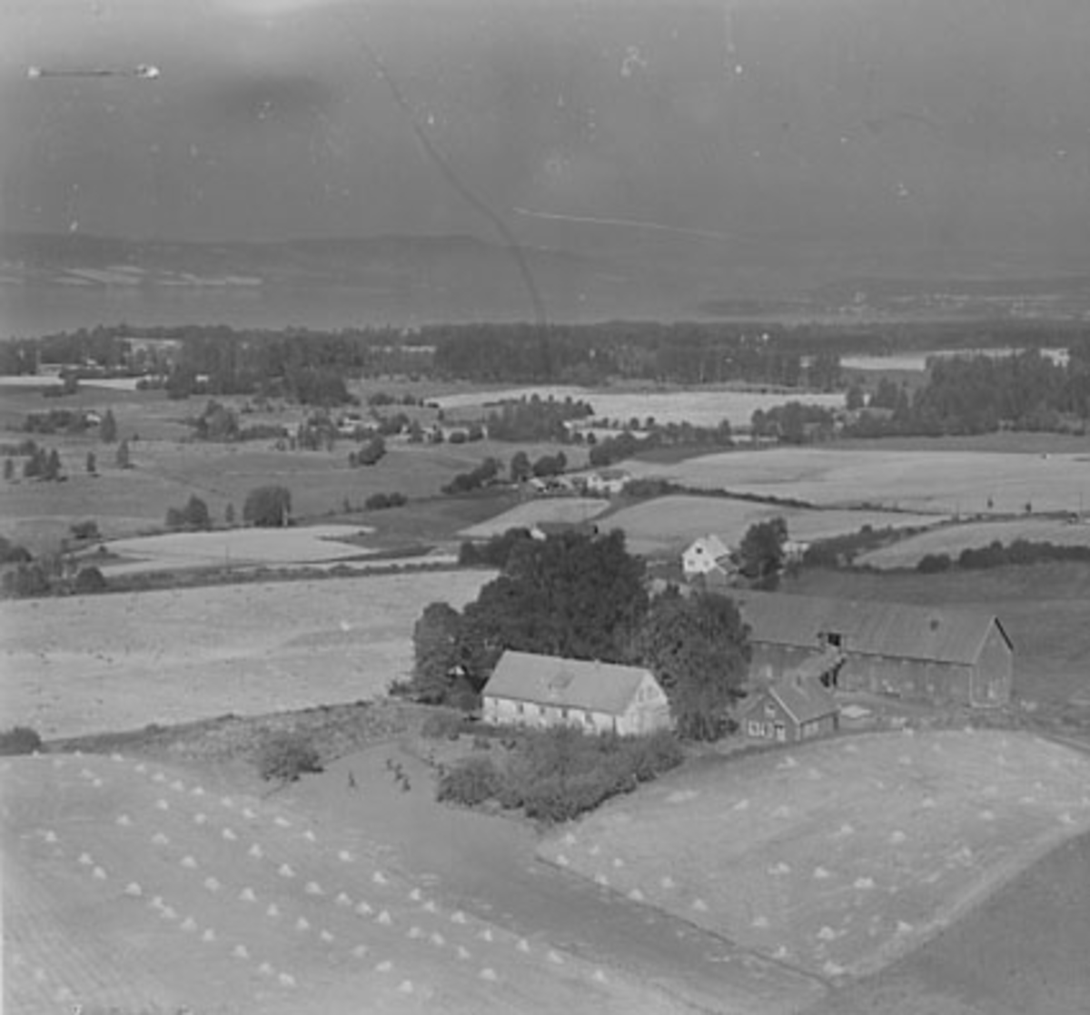 Widerøes Flyveselskap A/S, FLYFOTO AASTERUD, ÅSTERUD, STANGE