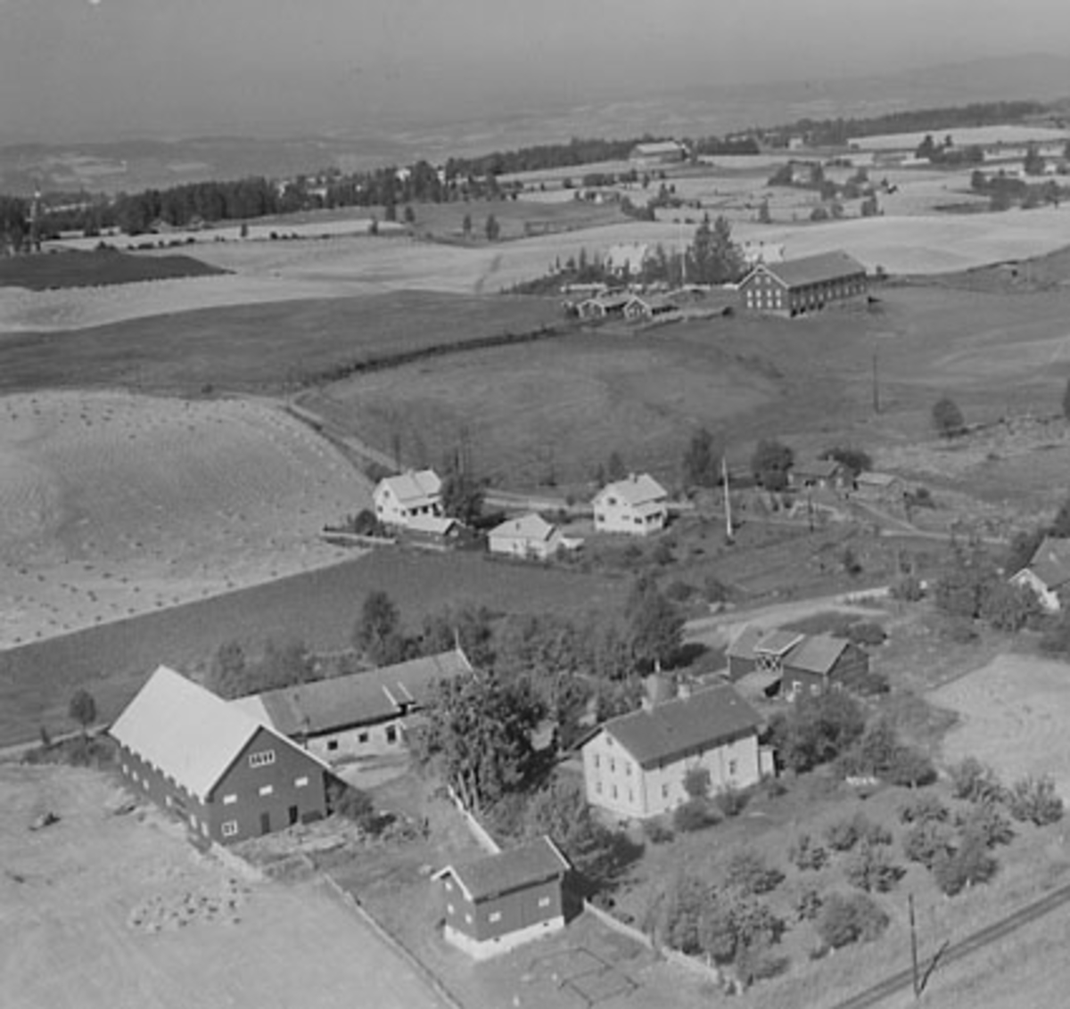 Widerøes Flyveselskap A/S, FLYFOTO NØKLEHOLM, STANGE