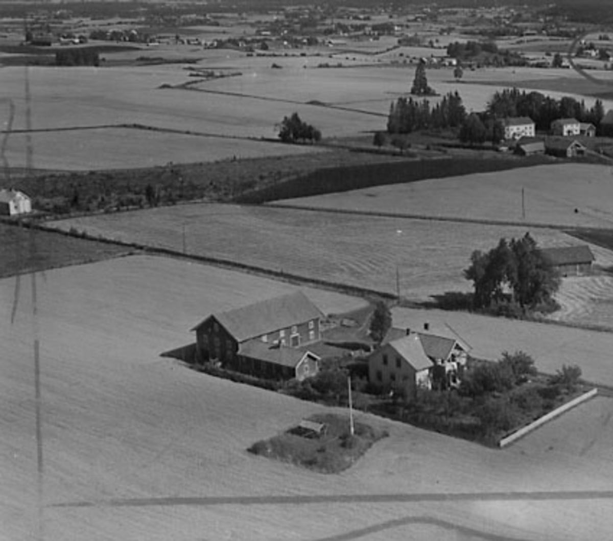 Widerøes Flyveselskap A/S, FLYFOTO AUSTAD SØNDRE, OUSTAD, ROMEDAL