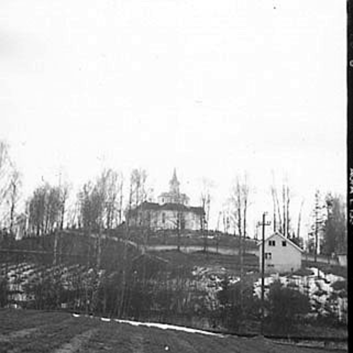 Anno Domkirkeodden, EKSTERIØR: TANGEN KIRKE, TANGEN,