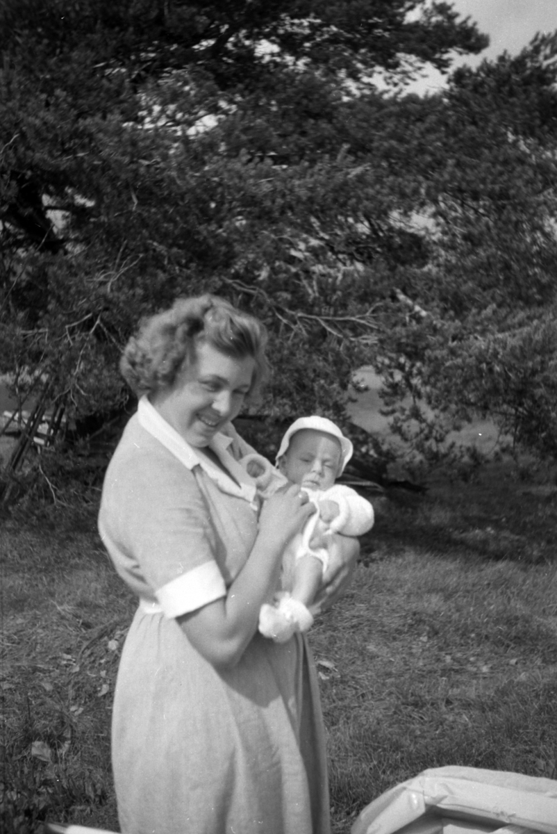Håkon Prestkværn, Ukjent kvinne med en baby på armen.