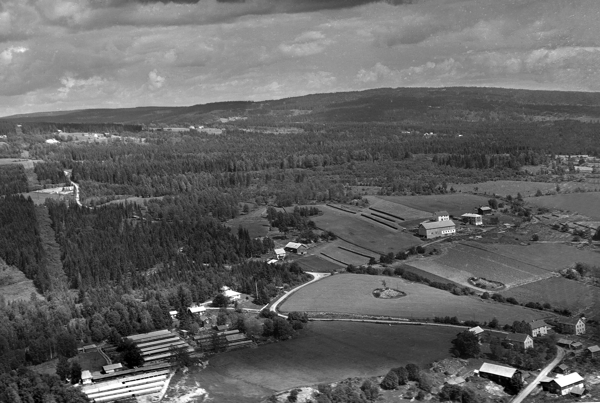 Anno Domkirkeodden, Kirkeby. Stor-Kylstad-gardene nederst i høyre hjørne, flyfoto, landskap, Furnes.