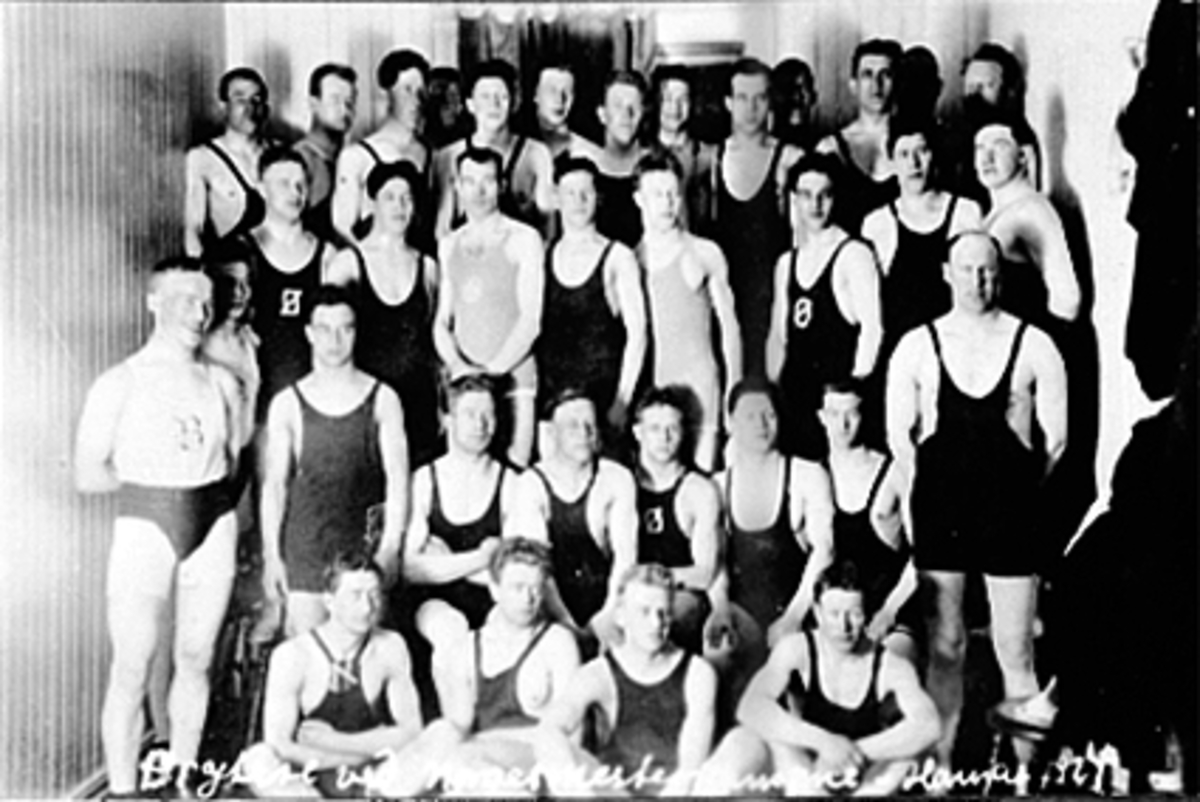 Anno Domkirkeodden, Gruppe 34 brytere. Norgesmesterskapet på Ridehuset i Hamar i 1924, arrangert av "Fagen", Fagforeningens Idrettsforening stiftet i 1916. Tre av klubbens egne var med: Syver Emilsen (bantam), Leif Synstad (fjærvekt) og Ole Paulsen (mellomvekt). Kongepokalen gikk til Arthur Nord.