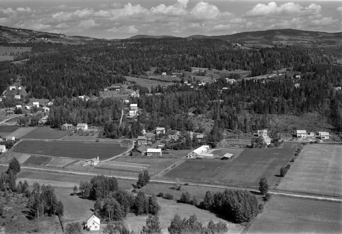 Widerøes Flyveselskap A/S, Flyfoto av bebyggelse, Moelv, Ringsaker.