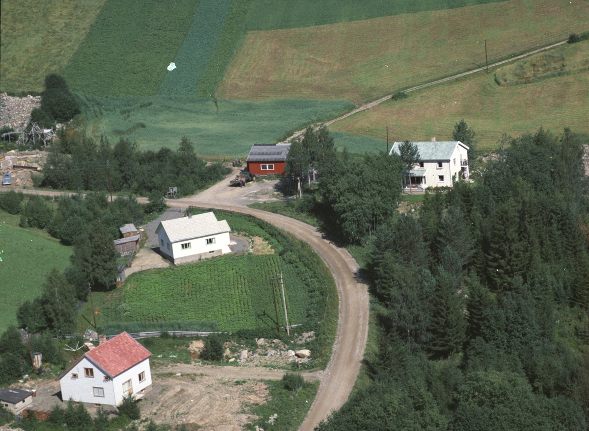 Widerøes Flyveselskap A/S, Flyfoto av Grønli ved Brandbutajet, Moelv, Ringsaker.