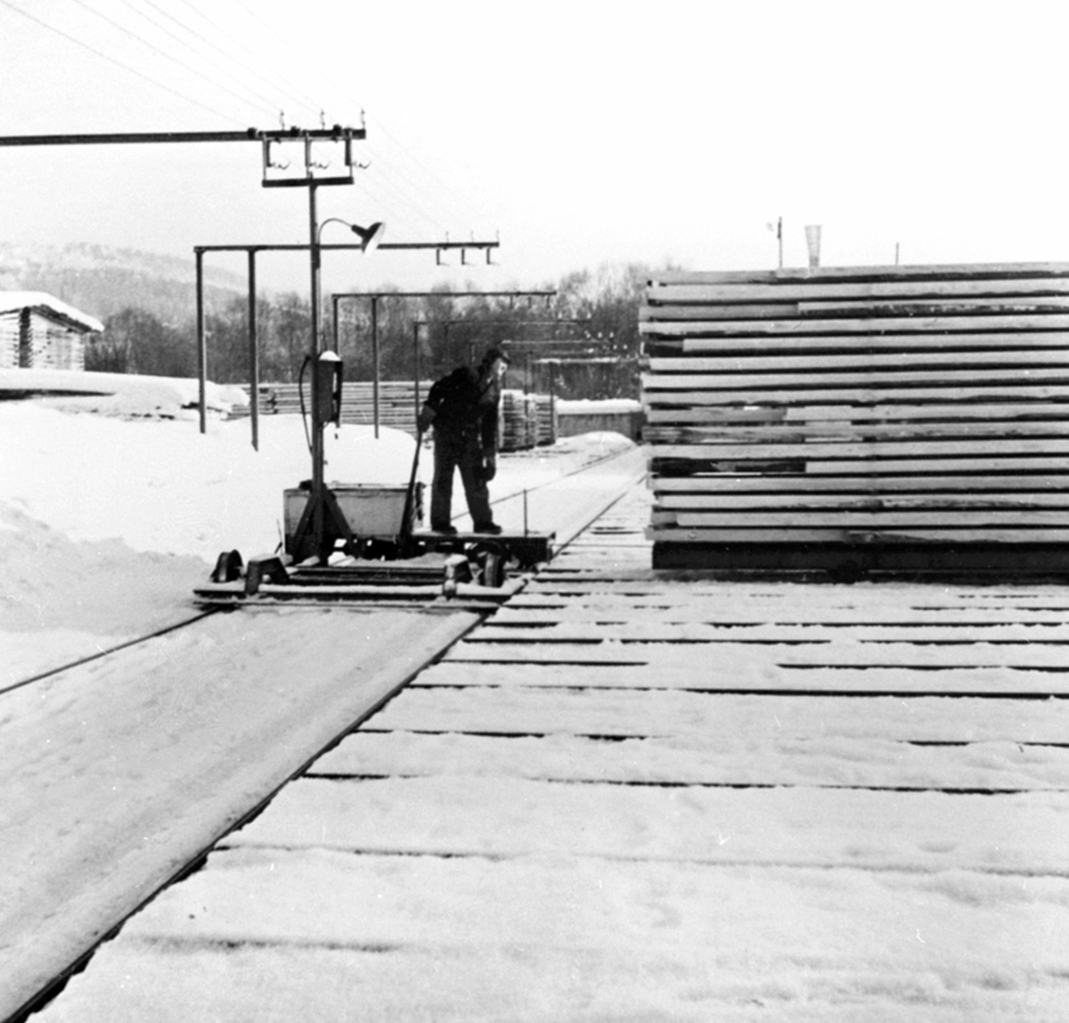 Anno Domkirkeodden, Utendørs lagring av trelast, vinter, Berger LAngmoen A/S, Brumunddal.