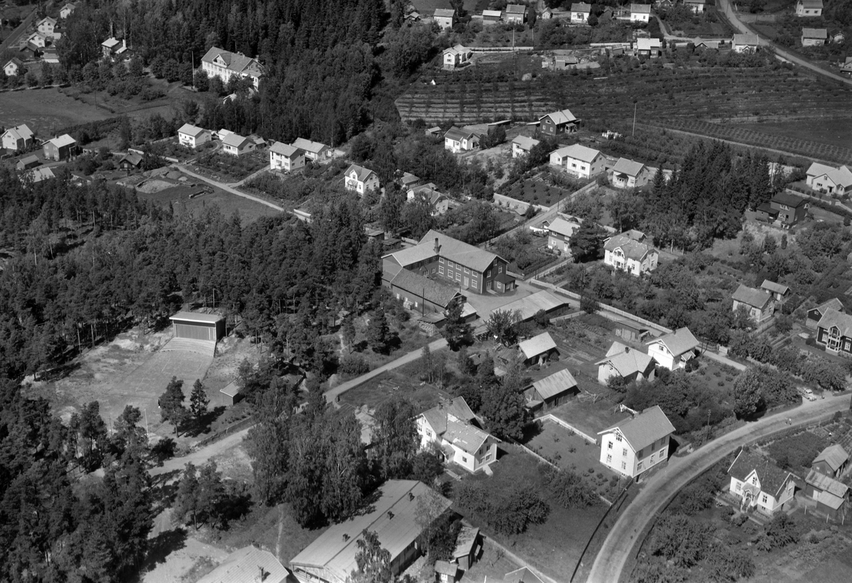 Widerøes Flyveselskap A/S, Flyfoto av Moelv, Johansens Trevarefabrikk A/S. Ringsaker.
