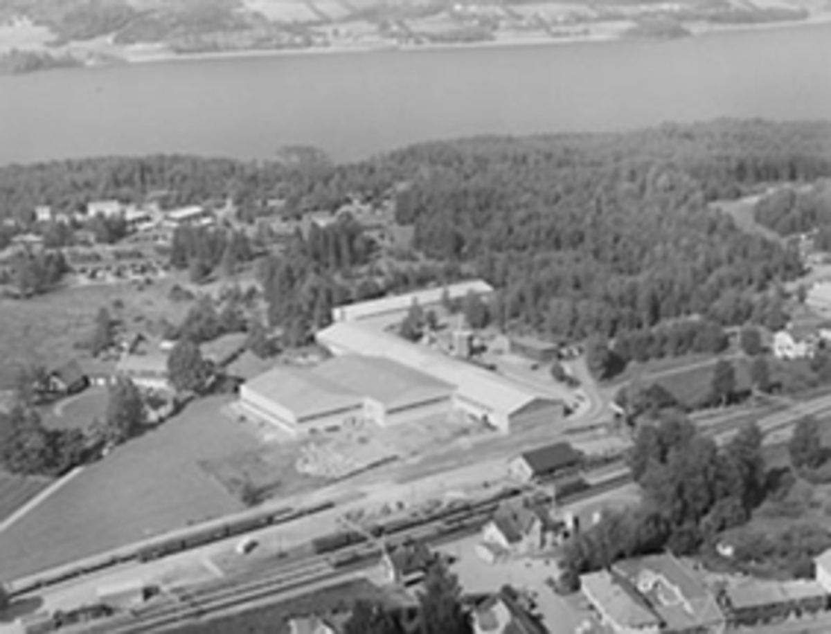 Widerøes Flyveselskap A/S, Flyfoto av Moelven Bruk, Laminator.