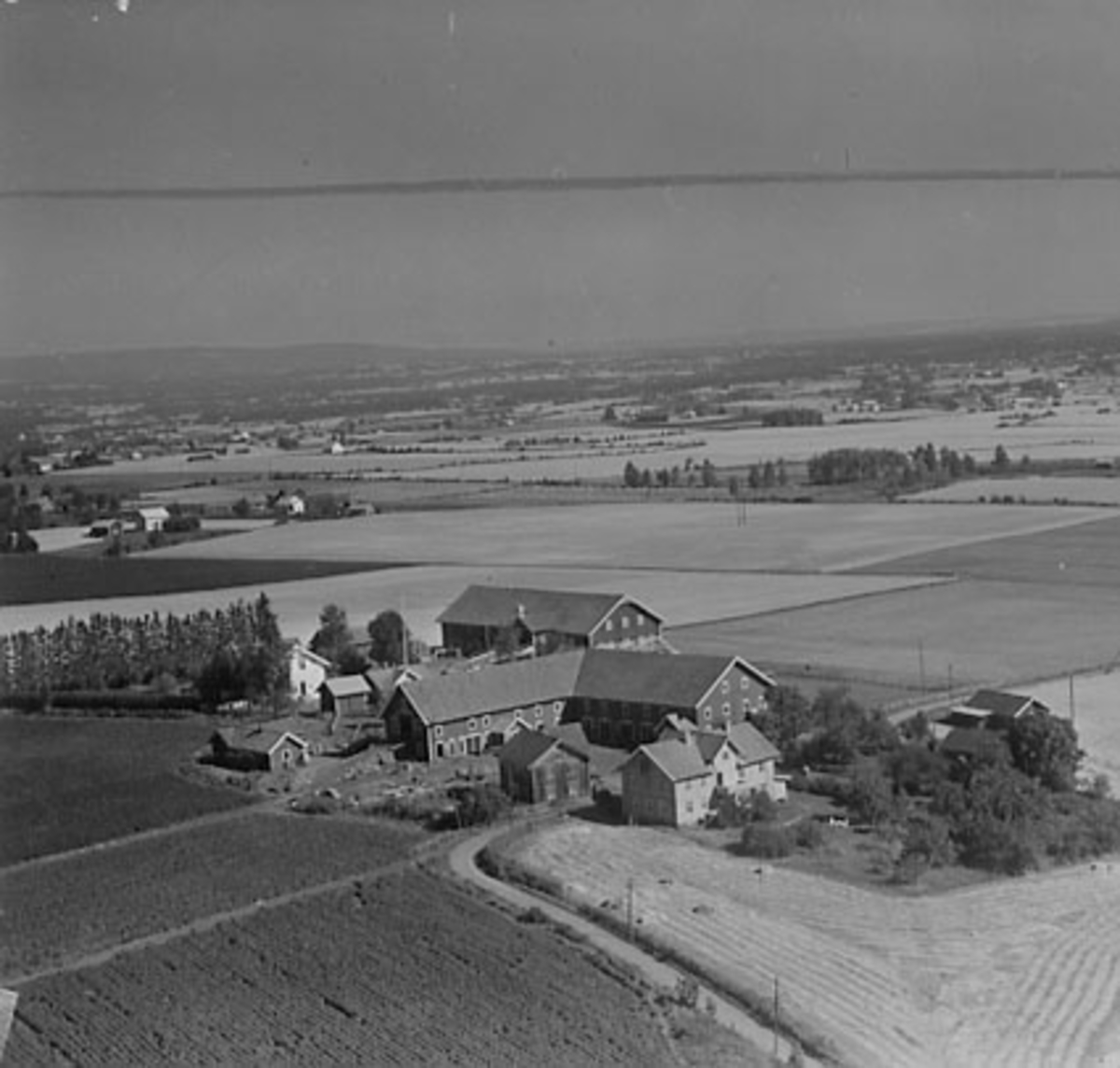 Widerøes Flyveselskap A/S, FLYFOTO FINSTAD SØNDRE, ROMEDAL