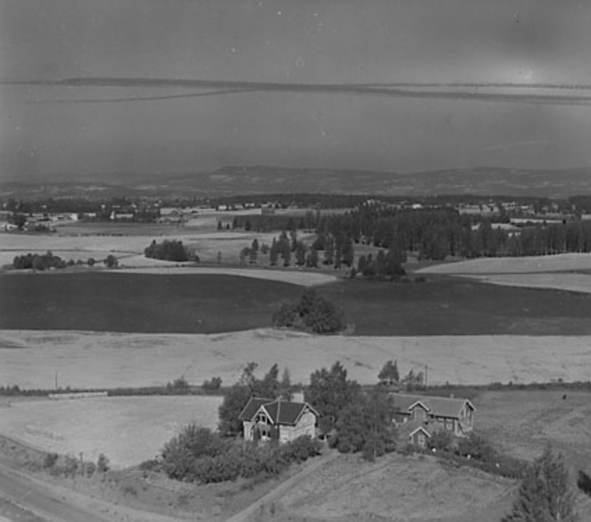 Widerøes Flyveselskap A/S, FLYFOTO BAKKEN, STANGE