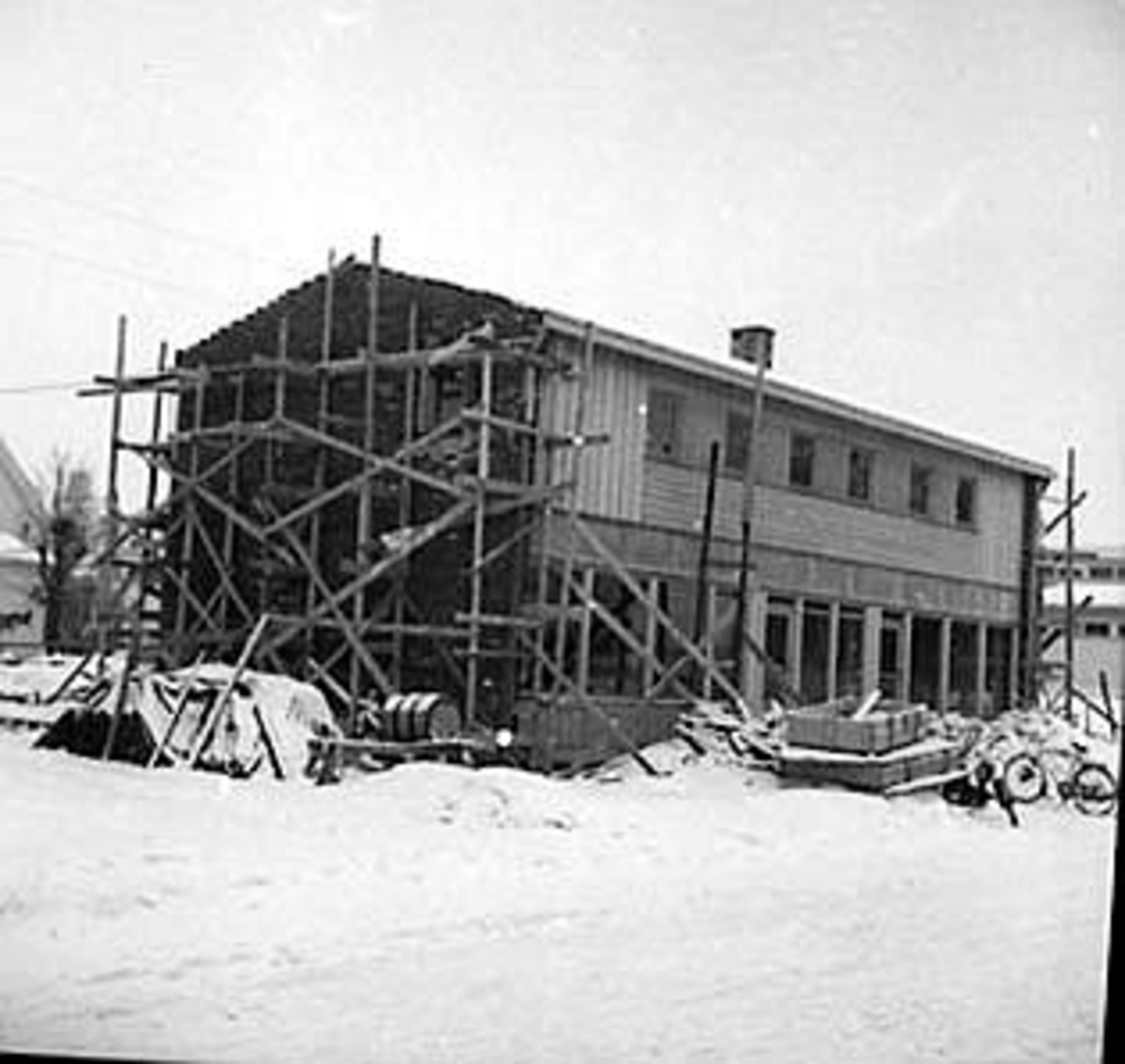 Anno Domkirkeodden, EKSTERIØR: BROVOLDS BYGG UNDER BYGGING, VINTER, SKOLEGATA. , STANGEBYEN