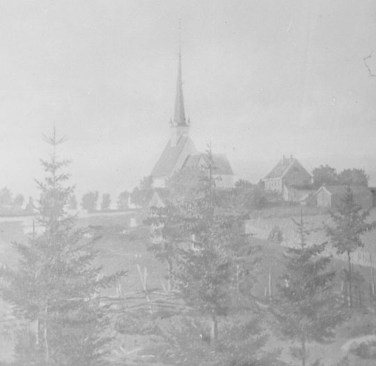 Normann Helger, EKSTERIØR: STANGE KIRKE MED STABBURSKLOKKE PÅ PRESTEGÅRDEN