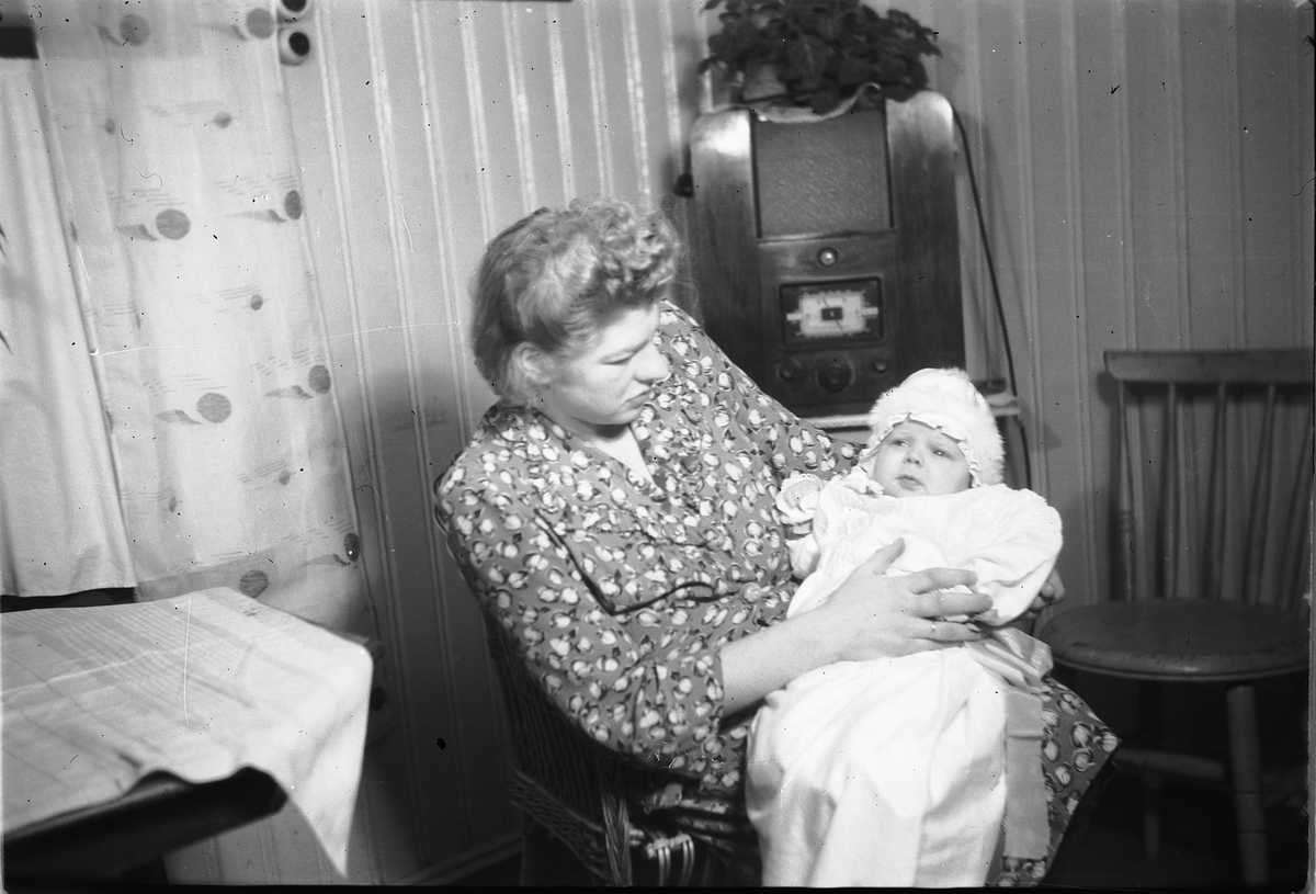 Håkon Prestkværn, Ukjent mor med baby på armen.